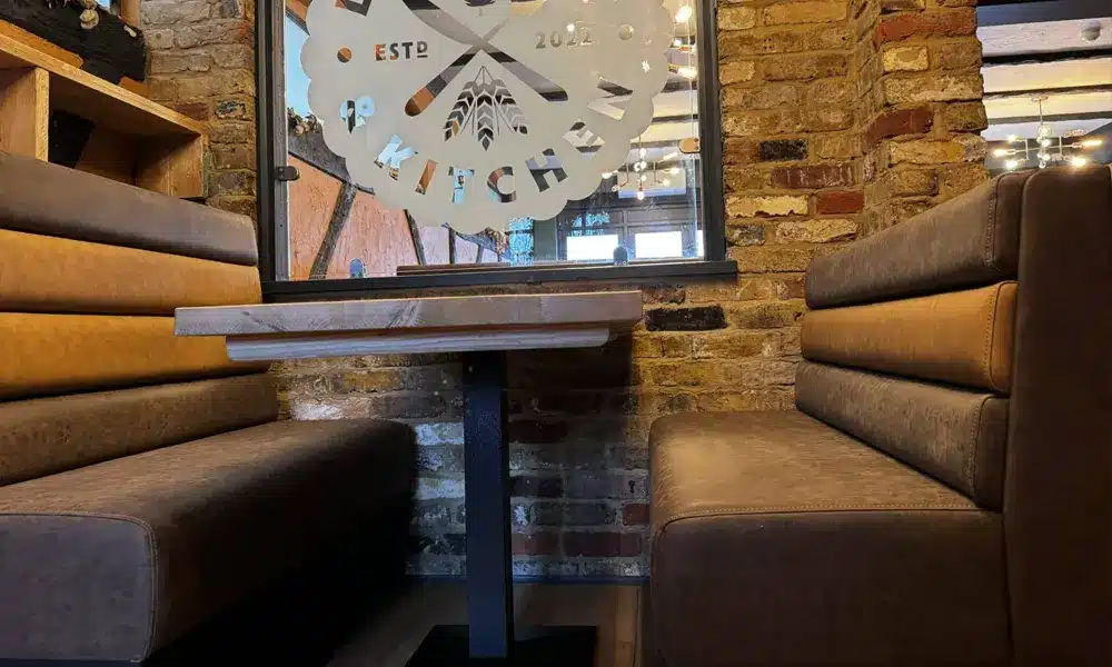 Close-up of horizontal fluted booth seating upholstery installed by HCF Contract Furniture at Legra Tap & Kitchen.