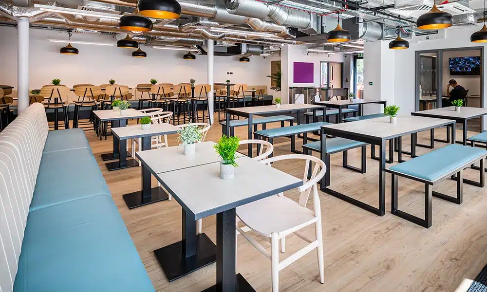 Kansas banquette seating along the café wall at Drayton Manor High School with contract-grade upholstery