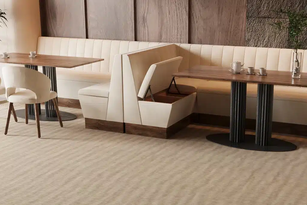 Haven fluted U shape set installed in a restaurant with table and accessories.